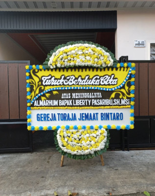 Papan Bunga Duka di Lunang