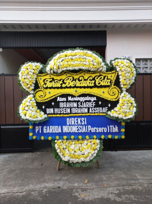 Papan Bunga Duka di Lunang