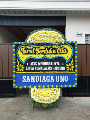 Papan Bunga Duka di Lunang